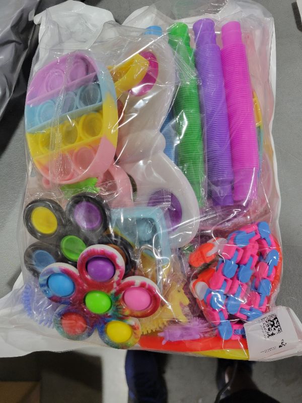 Photo 1 of BAG OF POP TOYS