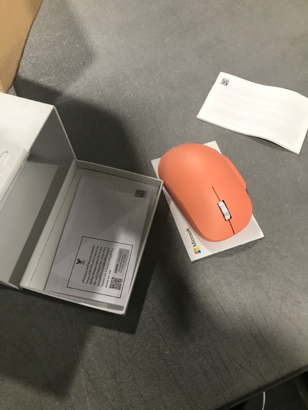 Photo 2 of Microsoft Bluetooth Ergonomic Mouse - Peach - with comfortable Ergonomic design, thumb rest, up to 15months battery life. Works with Bluetooth enabled PCs/Laptops Windows/Mac/Chrome computers