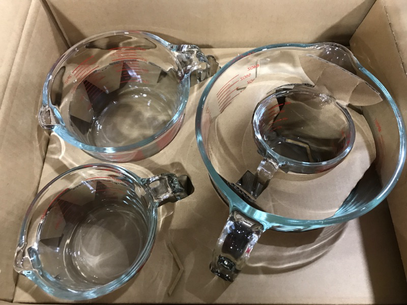 Photo 1 of AmazonCommercial Glass Measuring Cup Set, 4 Piece Set Includes 1 Cup, 2 Cup, 4 Cup, and 8 Cup 1+2+4+8 cup