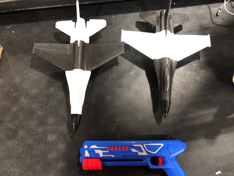 Photo 1 of 3 TOYS - 2 AIRPLANES AND 1 PLASTIC FAKE GUN