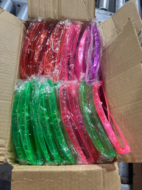Photo 1 of  Glow in the Dark Party Supplies for Kids, LED Light Up Toys Neon Party Supplies with Flashing Glasses, Glow Sticks, Finger Lights Light for Adults Neon Glow Halloween Birthday Party Disco Party Easter Gifts