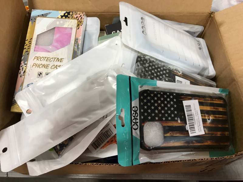 Photo 1 of Box FULL of Phone Cases and Smart Watch Bands- Various Styles, Models and Designs!!!