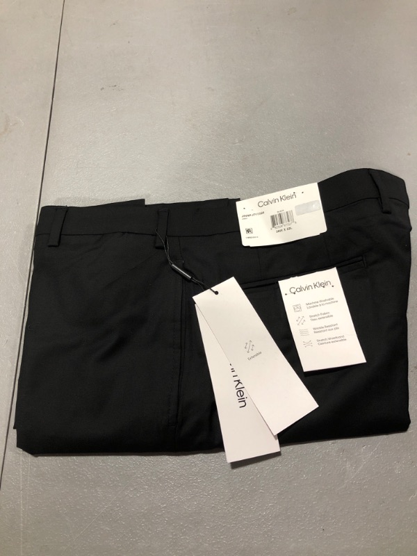 Photo 1 of Calvin Klein Men's Stretch Flat Front Pants, Black, 36 X 32