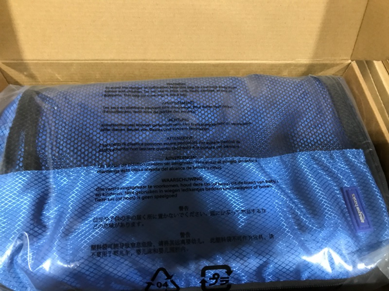 Photo 1 of Amazon Basics 4 Piece Packing Travel Organizer Cubes Set - 2 Medium and 2 Large, Blue blue Organizer