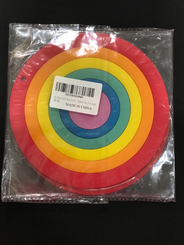 Photo 2 of 2 Pack of Round Rainbow Silicone Trivets