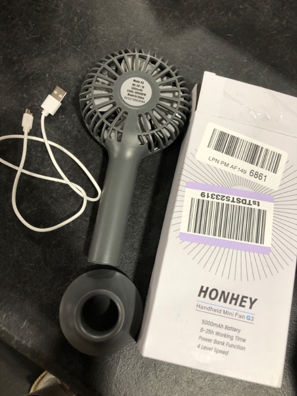 Photo 2 of HonHey Handheld Fan, 5000 mAh Portable Fan[8-25H Working Time] with Rechargeable Battery, 4 Speed Personal Cooling Desk Fan with Power Bank, Mini Hand Held Operated Makeup Fan for Women Outdoor
