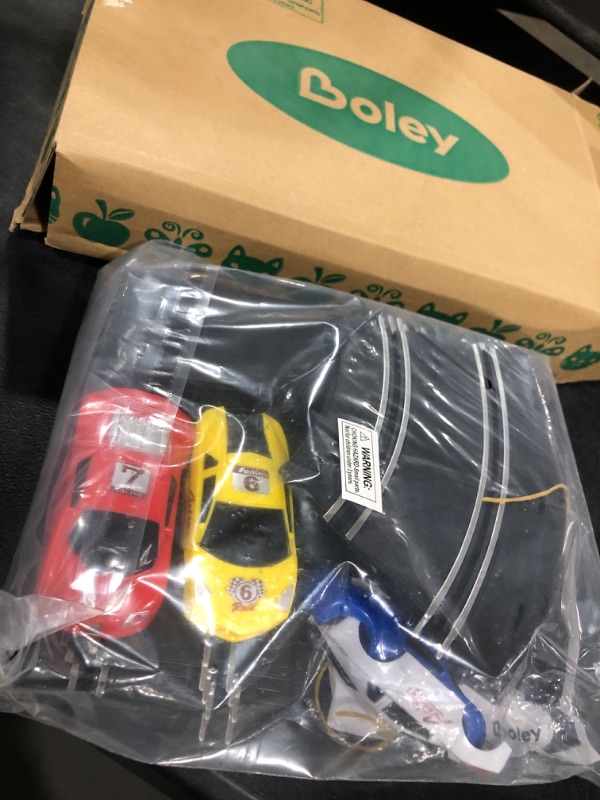 Photo 2 of Boley Slot Car Race Track Set - Race Track Set STEM Building Toys for Boys and Girls - 2 Cars and 2 Hand-Operated RC Controllers Included - Ages 6+