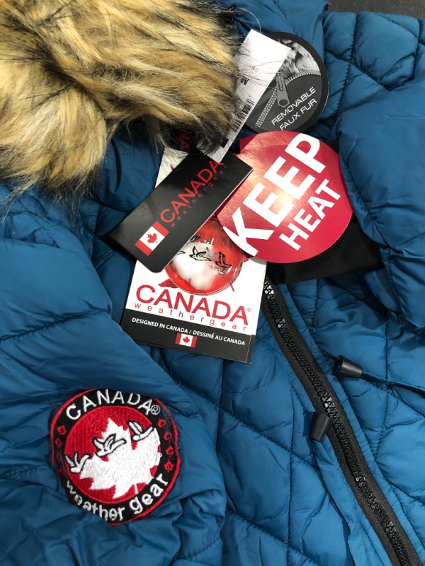 Photo 1 of CANADA WEATHER GEAR Women's Midweight Long Glacier Shield Jacket Medium Peacock Black