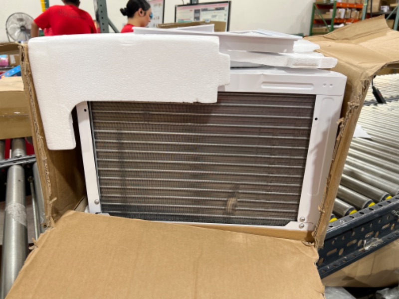 Photo 1 of Amazon Basics Window-Mounted Air Conditioner with Remote - Cools 250 Square Feet, 6000 BTU, Energy Star, Energy Star