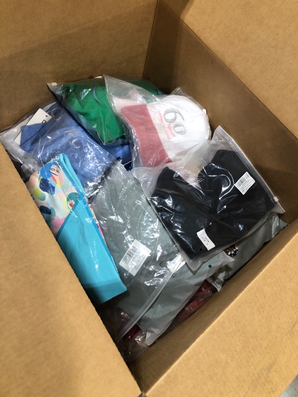 Photo 5 of Box lot of clothing. Assortment of sizes and styles for men and women and kids. Box lot is sold as is.