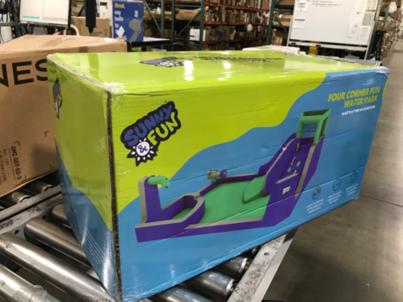 Photo 1 of Sunny & Fun Four Corner Inflatable Water Slide Park – Heavy-Duty for Outdoor Fun - Climbing Wall, Slide & Deep Pool – Easy to Set Up & Inflate with Included Air Pump & Carrying Case Purple - 204.7 x 144.2 x 82.7 inches
