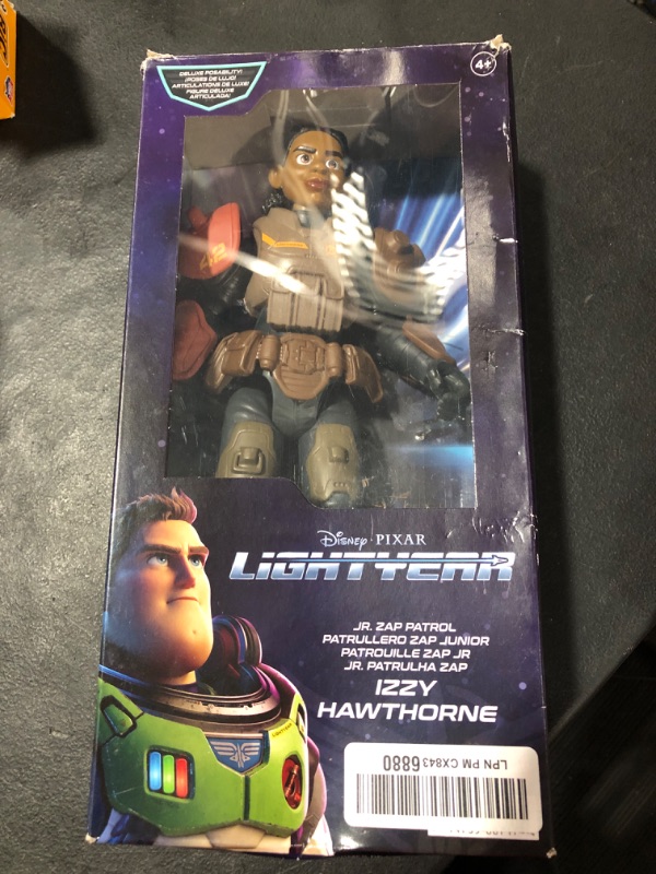 Photo 2 of Disney Pixar Lightyear Large Scale 12 Inch Scale Jr ZAP Patrol Izzy Hawthorne Action Figure, 14 Movable Joints, Movie Collectible Toy 4 Years & Up Jr. ZAP Patrol Izzy Hawthorne