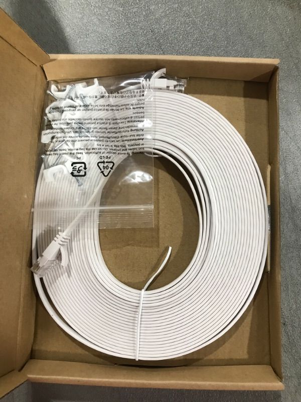 Photo 2 of Amazon Basics Cat 6 Gigabit Ethernet Patch Internet Cable, Flat - 30FT, 1Pack, White - Include 15 Nails 30-Foot White 1