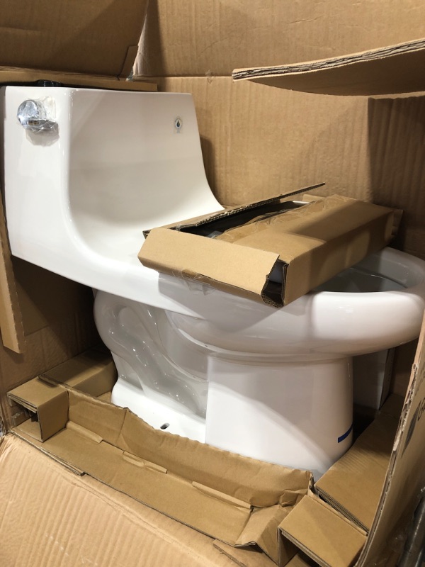 Photo 2 of 1-Piece 1.28 GPF High Efficiency Single Flush Elongated Toilet in White, Seat Included