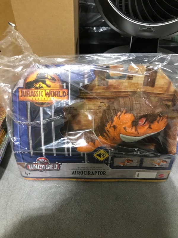 Photo 2 of Mattel Jurassic World Dominion Uncaged Rowdy Roars Atrociraptor Tiger Dinosaur Action Figure, Toy with Interactive Motion & Sound