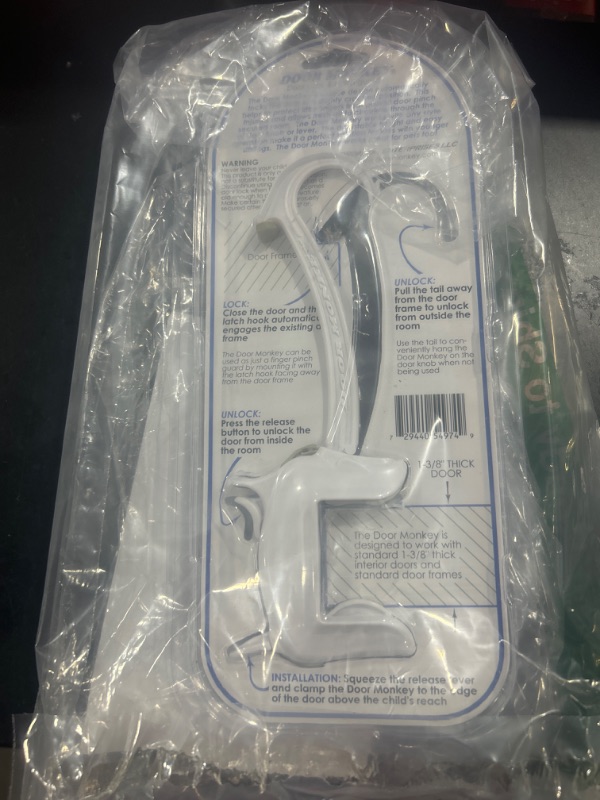 Photo 1 of DOOR MONKEY Child Proof Door Lock & Pinch Guard - For Door Knobs & Lever Handles - Easy to Install - No Tools or Tape Required - Baby Safety Door Lock For Kids - Very Portable - Great for Dogs & Cats White