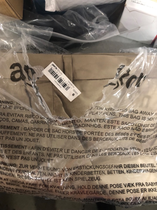 Photo 1 of Amazon Essentials Men's Straight-Fit Stretch Golf Pant Polyester Blend Khaki Brown 
SIZE 42W x 32L