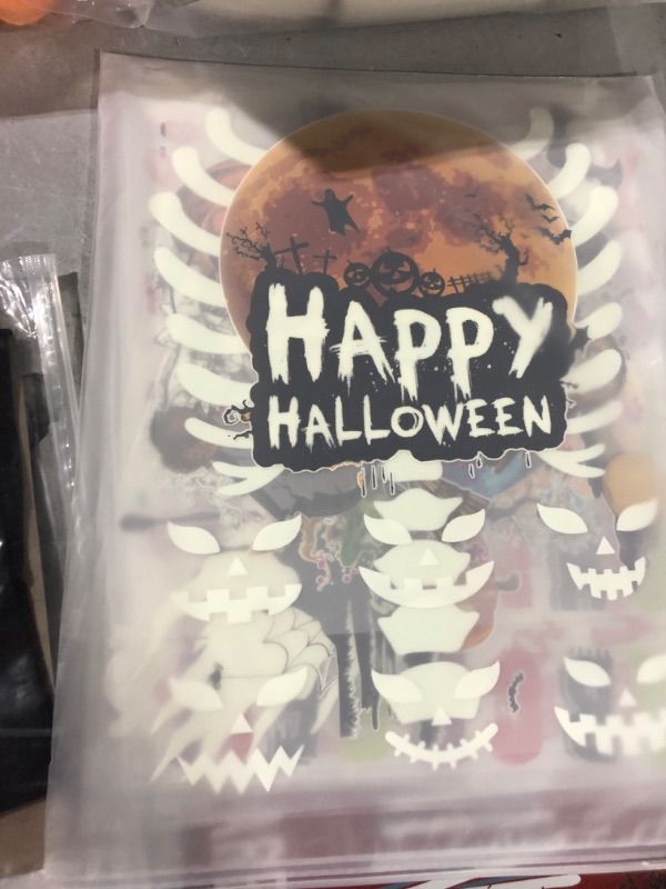 Photo 1 of 20 Sheets Glow in Dark Halloween Iron on Transfers Decal Stickers Patches Halloween HTV Heat Transfer Pumpkin Ghost Skull Iron on Transfer for DIY T-Shirt Fabric Halloween Decorations (Spooky Style)