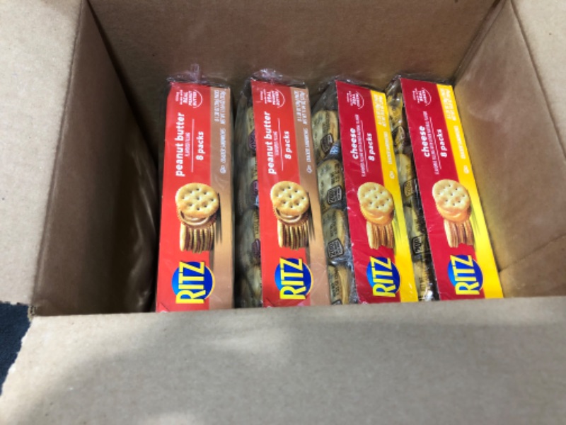 Photo 1 of 2- Ritz Peanut Butter 8 packs and 2-  Cheese 8 packs. Total of 4 packs of Ritz crackers.