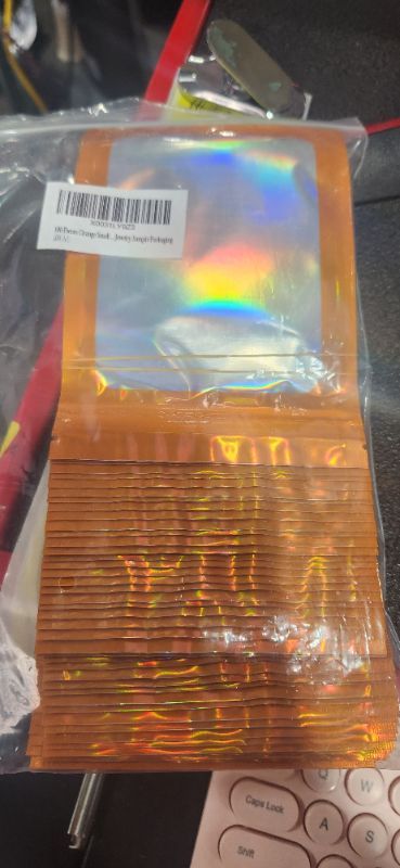 Photo 2 of 100 Pieces Orange Smell Proof Mylar Bag,Resealable Holographic Packaging bags,Cute Package Bags for Small Business,Sealed Mylar Foil Pouch Bags for Gift,Candy,Jewelry,Sample Packaging

