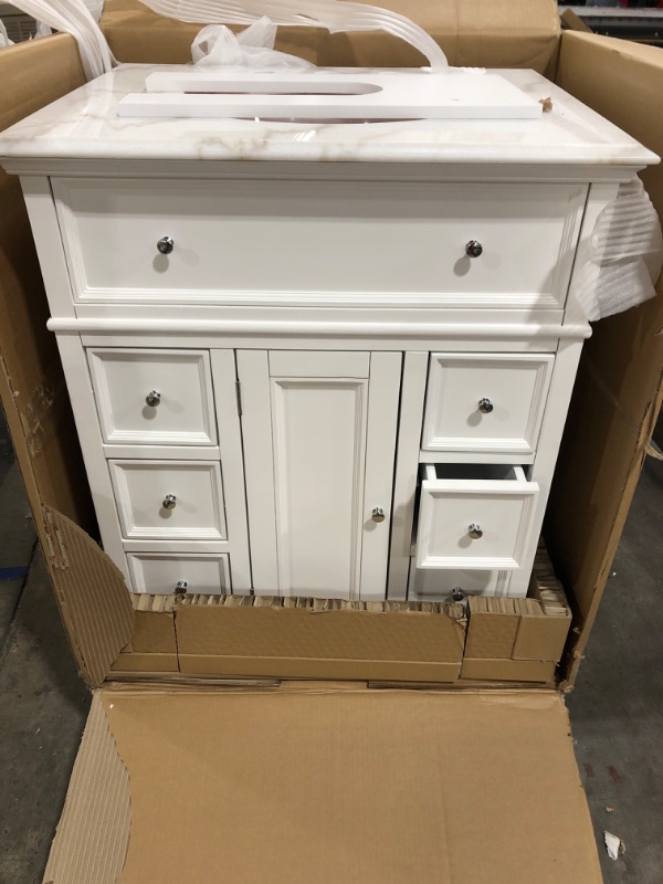 Photo 2 of 
Home Decorators Collection
Hampton Harbor 28 in. W x 22 in. D Bath Vanity in White with Natural Marble Vanity Top in White