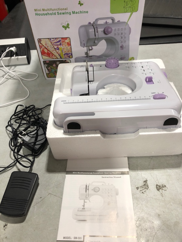 Photo 2 of  Mini Sewing Machine for Beginners and Kids, Sewing Machines with Reverse Sewing and 12 Built-in Stitches, Portable Sewing Machine 