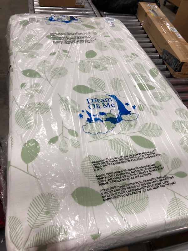 Photo 2 of Dream On Me 2 in 1 Infant Crib and Toddler Bed Mattress | Greenguard Gold and JPMA Certified Crib Mattress | Copper-Infused Toddler Layer | Removable Zipper Cover | Utopia Green---minor package damage 