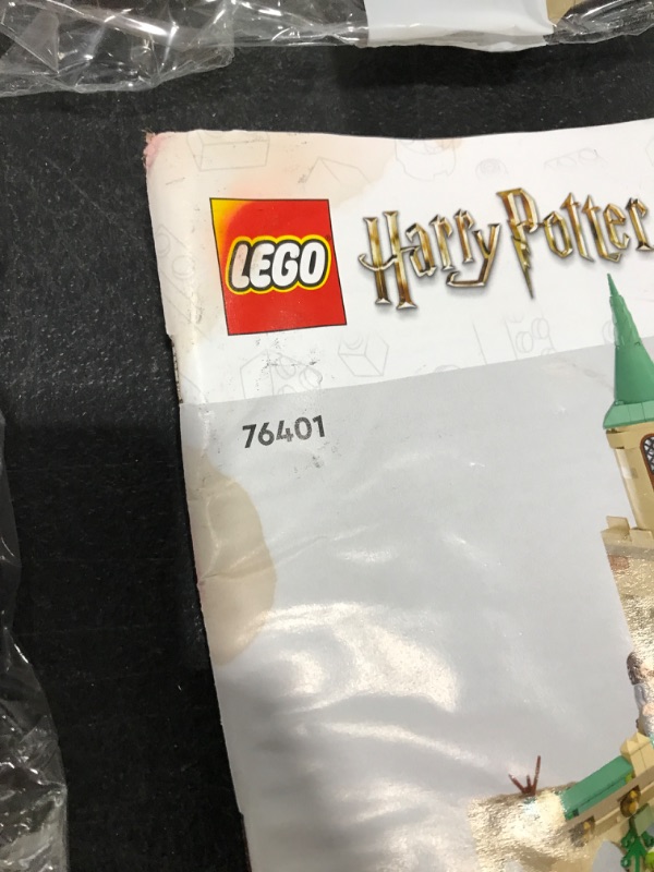 View 3 of LEGO Harry Potter Hogwarts Courtyard: Sirius’s Rescue 76401 Building Toy Set from Prisoner of Azkaban Movie Featuring Hermione Granger and Sirius Black for Kids, Girls, and Boys Ages 8+ (345 Pieces). BOX WAS WATER DAMAGED. MINOR DAMAGE TO INSTRUCTION BOOK