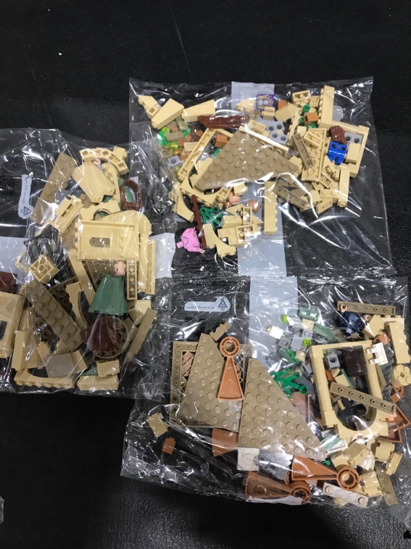 View 5 of LEGO Harry Potter Hogwarts Courtyard: Sirius’s Rescue 76401 Building Toy Set from Prisoner of Azkaban Movie Featuring Hermione Granger and Sirius Black for Kids, Girls, and Boys Ages 8+ (345 Pieces). BOX WAS WATER DAMAGED. MINOR DAMAGE TO INSTRUCTION BOOK