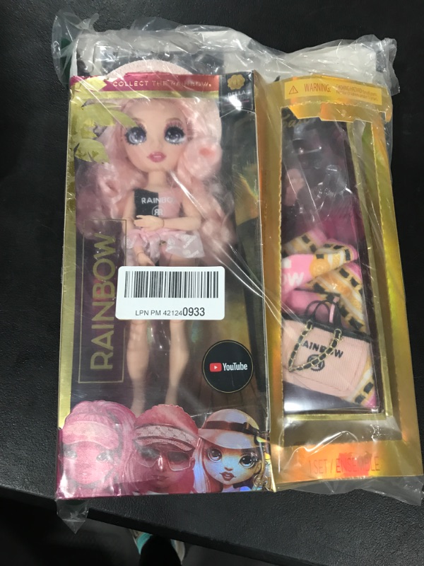 Photo 2 of Rainbow High Pacific Coast Bella Parker- Pink Fashion Doll with 2 Designer Outfits, Pool Accessories Playset, Interchangeable Legs, Toys for Kids, Great Gift for Ages 6-12+ Years