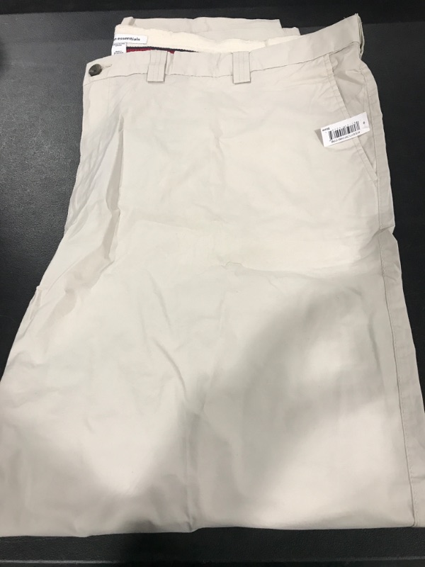 Photo 2 of AMAZON ESSENTIALS KHAKI PANTS SIZE 54X34 