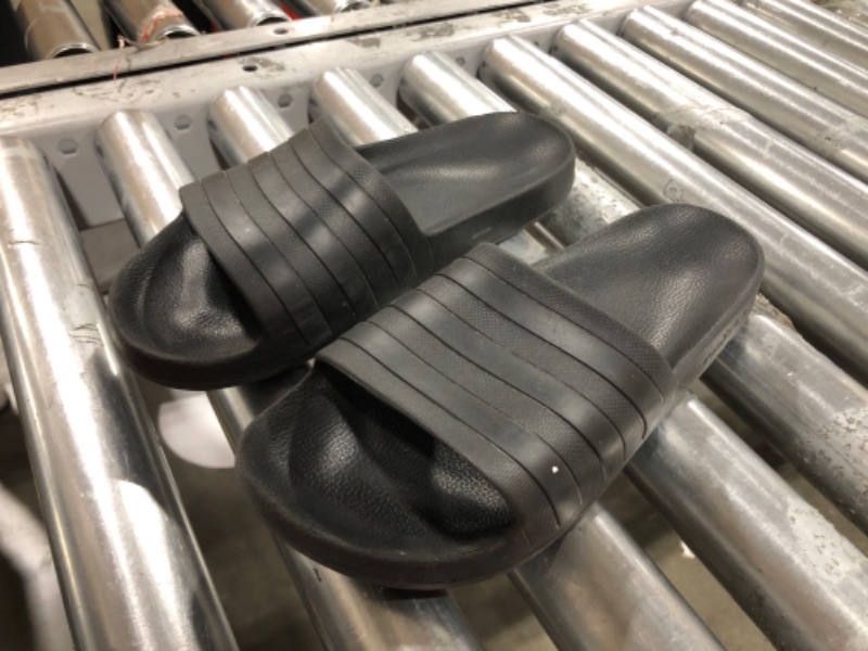 Photo 2 of adidas Unisex-Adult Adilette Aqua Slides Sandal 10 Women/9 Men Black/Black/Black