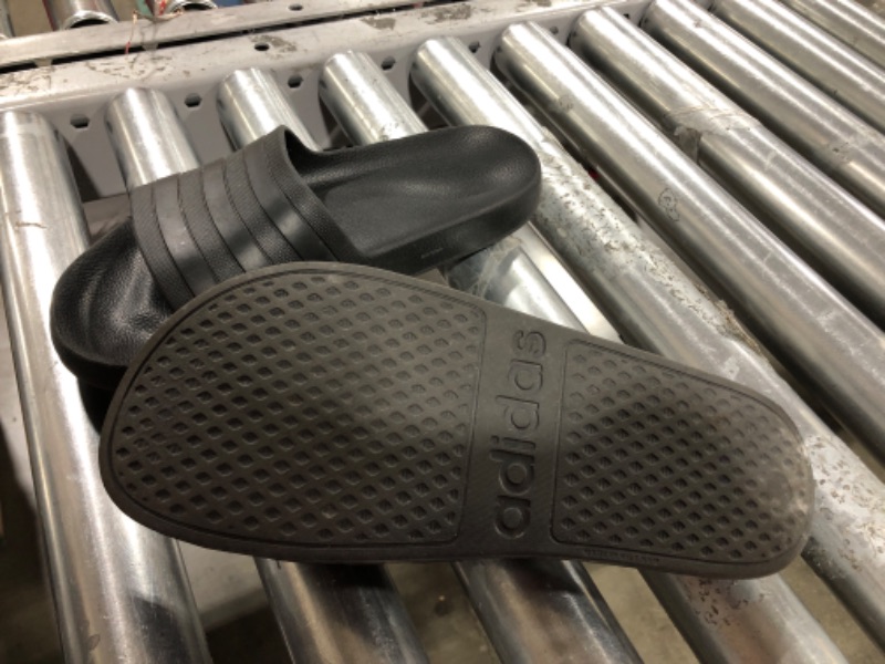 Photo 3 of adidas Unisex-Adult Adilette Aqua Slides Sandal 10 Women/9 Men Black/Black/Black