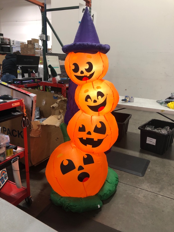 Photo 2 of 6 ft. H w LED Lights Orange, Purple and Green Plastic Stacked Pumpkins Halloween Inflatable