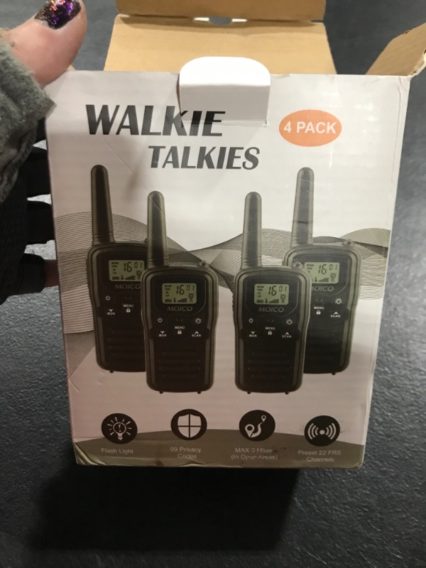 Photo 1 of 4 walkie talkies