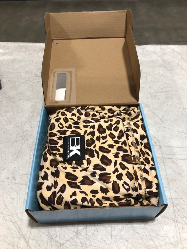 Photo 2 of Baby K'tan Baby Wrap Carrier - Pre Wrapped and Simple as 1-2-3, Pillowy Soft, Slip On - Not Like Any Newborn Sling, No Rings, No Tying, No Buckles - Original Leopard Love (Small) Leopard Love Small