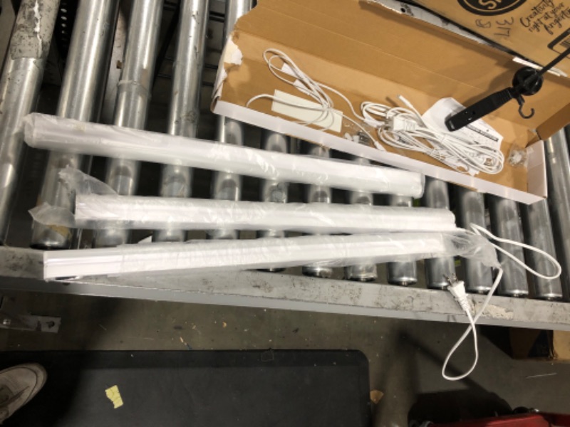 Photo 1 of Monios-L Linkable LED Under Cabinet & Closet LED T5 Light Bar, 2FT, 9W 800 Lumens, 4000K Daylight White, Plug and Play, 3 Pack