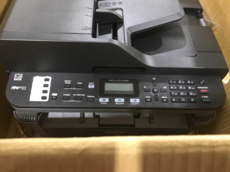 Photo 1 of Brother Monochrome Laser Printer, Compact All-In One Printer, Multifunction Printer, MFCL2710DW, Wireless Networking and Duplex Printing, Amazon Dash Replenishment Ready New Model: MFCL2710DW