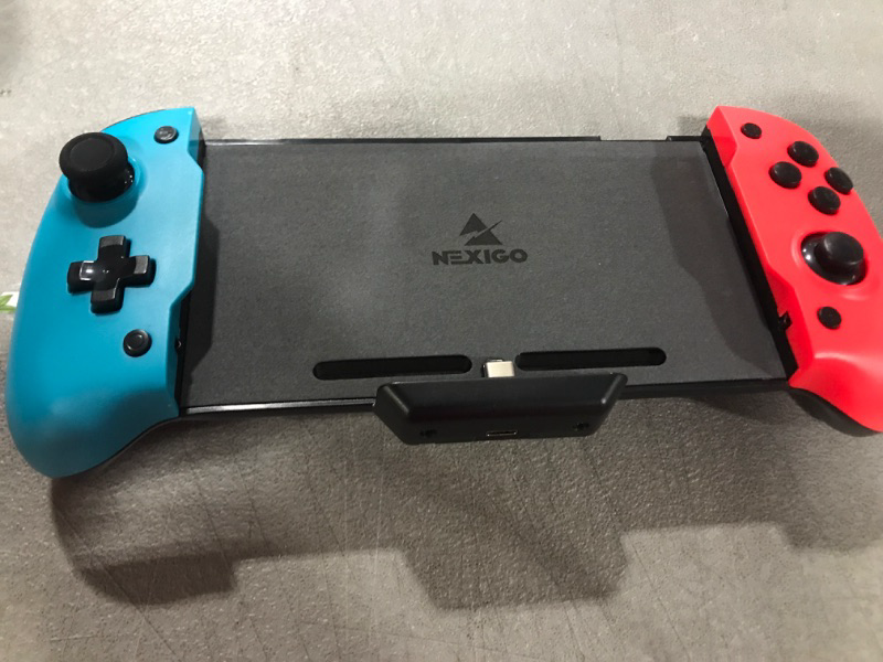 Photo 2 of NexiGo Switch Controller for Handheld Mode, Ergonomic Controller for Nintendo Switch with 6-Axis Gyro, Dual Motor Vibration, Compatible with All Games of Switch (Blue & Red) Not for OLED