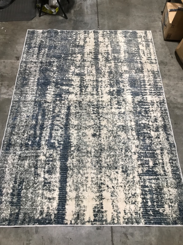 Photo 2 of Abstract Blue and Biege rug (5 x 7')