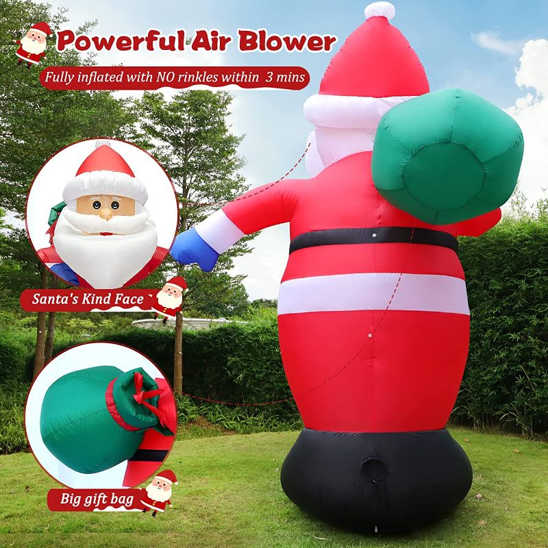 Photo 2 of 12 Feet Giant Christmas Inflatable Santa Claus Outdoor Yard Decorations, Blow up Santa Claus with Gift Bag, Huge Santa Carrying Present Sack, Outside Waterproof Xmas Decor for Party Garden Hall Plaza 12FT Inflatable Santa Claus