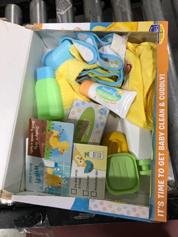 Photo 1 of Melissa & Doug Mine to Love Changing & Bathtime Play Set for Dolls – Diapers, Pretend Shampoo,Wipes, Towel, More (19 pcs)