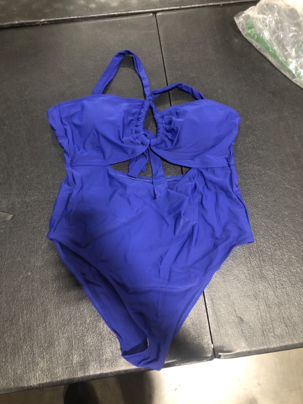 Photo 1 of Blue bathing suit. Size unknown