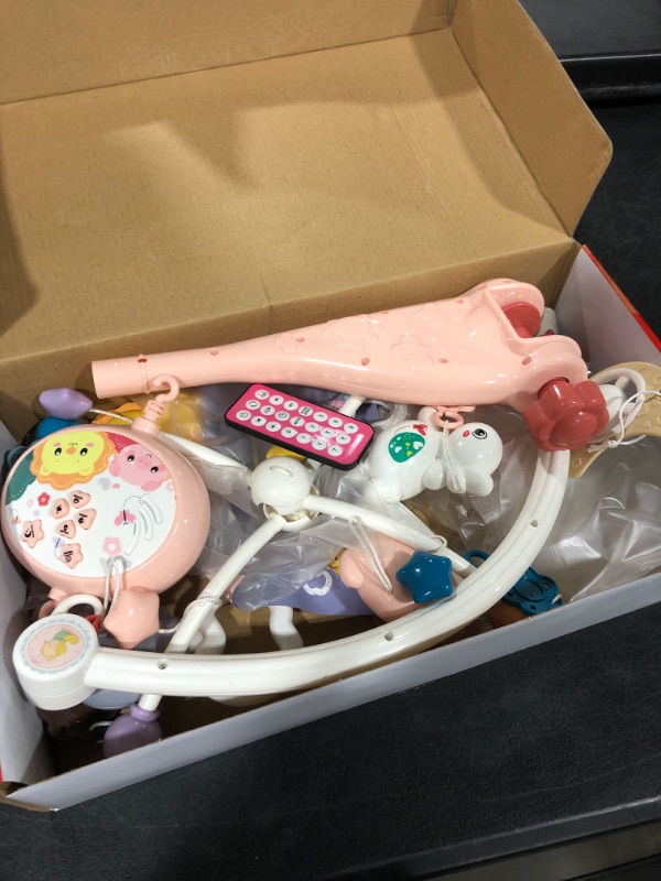 Photo 1 of Crib Mobile for Baby Melodious Music Soft Light Keep Baby Soothed with Remote Control, Timing, Rotation, Moon Projection Atmosphere Baby Toys 3 - 6 Month (Blue, Upgraded Version, Batteries Included)