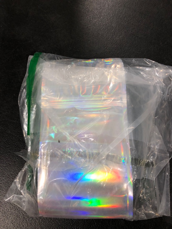Photo 2 of 100 Pieces Bags Holographic Packaging Bags Storage Bag for Food Storage (Holographic Color,4 x 6 Inches) 4x6 Inch (Pack of 100) Holographic color