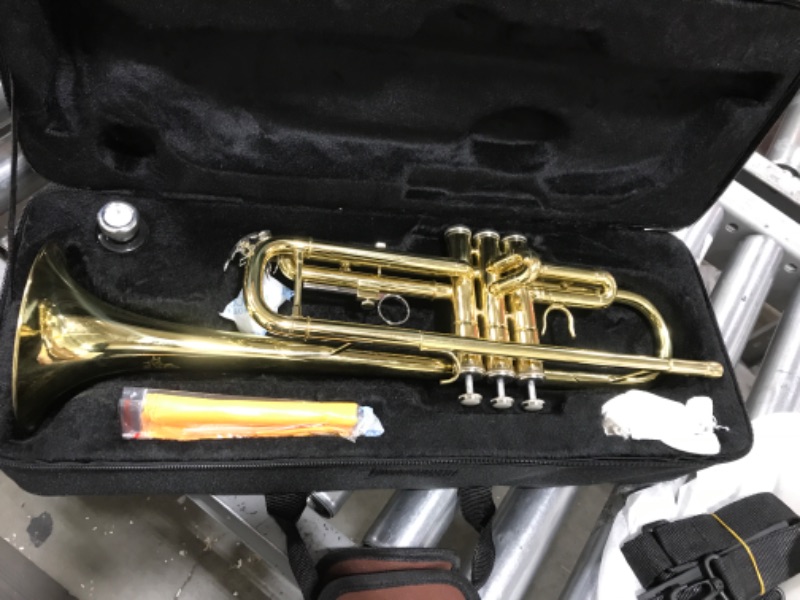 Photo 2 of Yasisid Bb Standard Trumpet Set for Beginners or Advanced Students, Brass Musical Wind Instruments with Hard Case, Cleaning Kit, 7C Mouthpiece, Cloth and Gloves (Lacquer Gold)