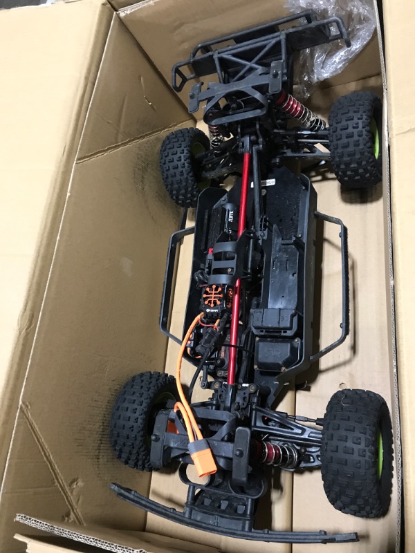 Photo 1 of ARRMA RC Truck 1/7 Mojave 6S V2 4WD BLX Desert Truck with Spektrum Firma (Ready-to-Run), Red/Black
(NOT FUNCTIONAL PARTS ONLY AND MISSING MULTIPLE PIECES BODY COVER AND BATTERY)