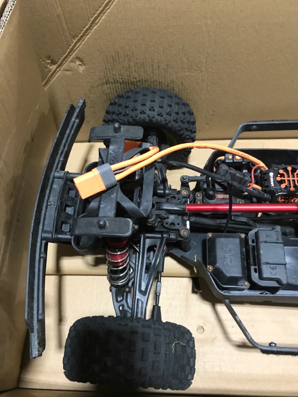 Photo 1 of ARRMA RC Truck 1/7 Mojave 6S V2 4WD BLX Desert Truck with Spektrum Firma (Ready-to-Run), Red/Black
(NOT FUNCTIONAL PARTS ONLY AND MISSING MULTIPLE PIECES BODY COVER AND BATTERY)
