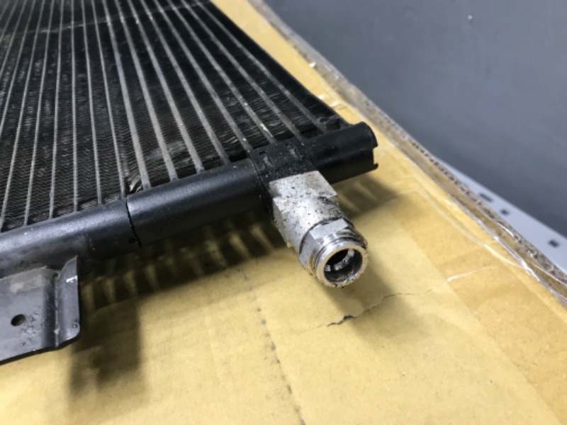 Photo 3 of *** USED *** ** UNABLE TO TEST FUNCTION ** ACDelco Professional 15-63889 Air Conditioning Condenser with Automatic Transmission Oil Cooler