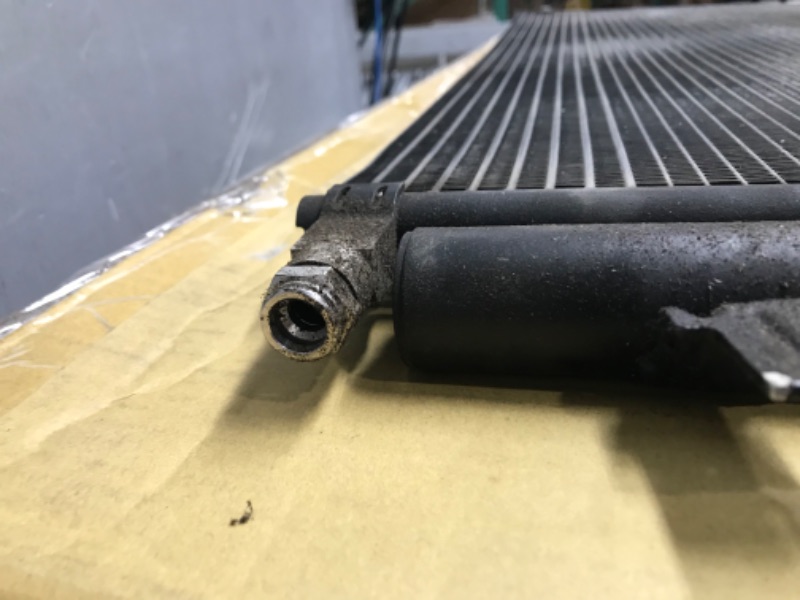 Photo 2 of *** USED *** ** UNABLE TO TEST FUNCTION ** ACDelco Professional 15-63889 Air Conditioning Condenser with Automatic Transmission Oil Cooler